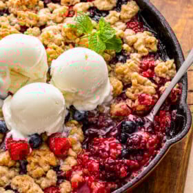 Cobbler with three scoops of ice cream.