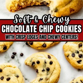 Chocolate chip cookies arranged on a marble countertop with a bite taken out of one cookie.