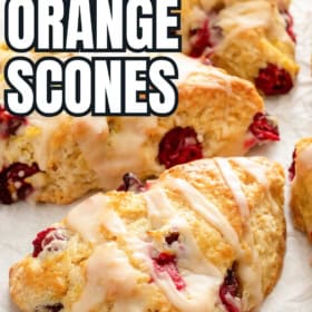 Orange cranberry scones are topped with a simple glaze.