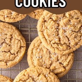 Chewy peanut butter cookies on a cooling rack.