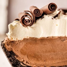 French silk pie is garnished with gorgeous chocolate curls.