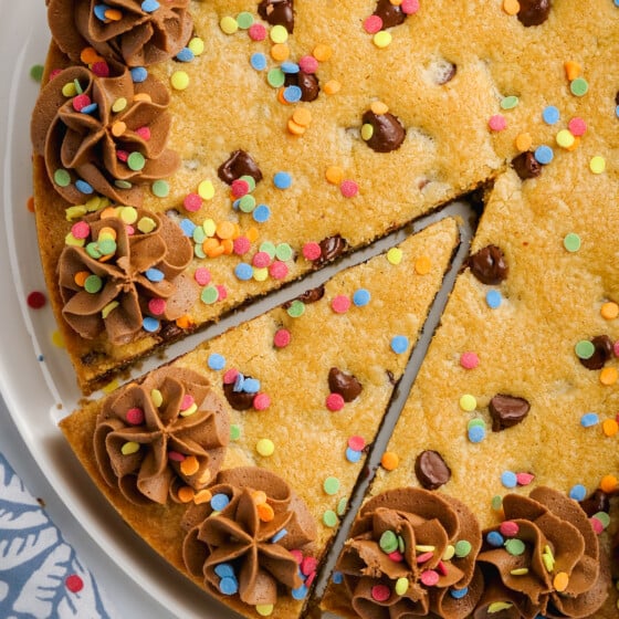 Slice of cookie with chocolate frosting.