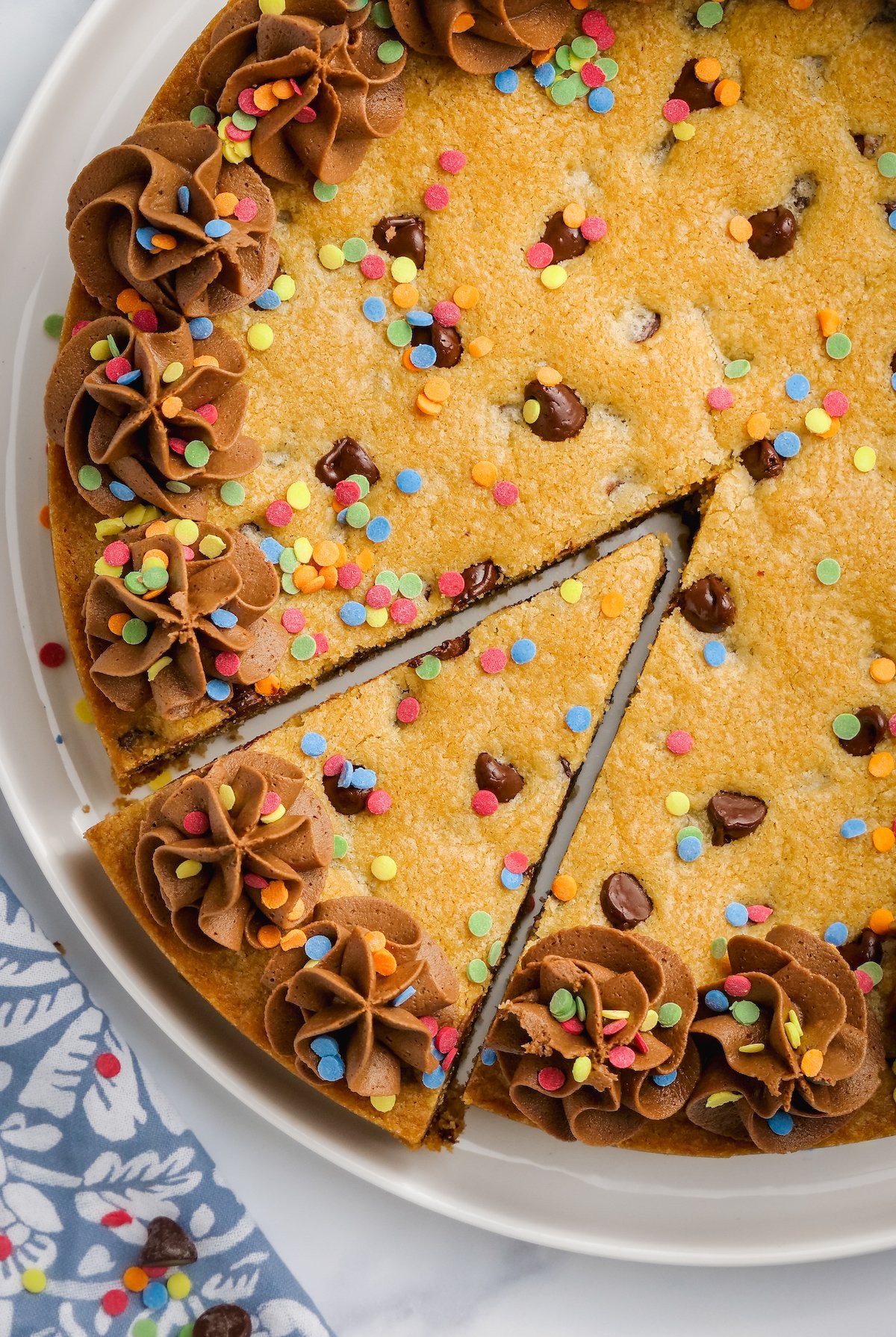 Slice of cookie with chocolate frosting.