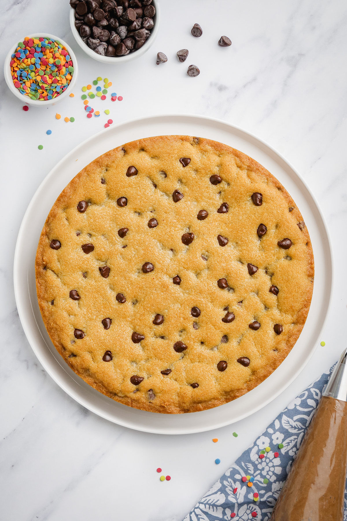 Baked chocolate chip cookie cake.