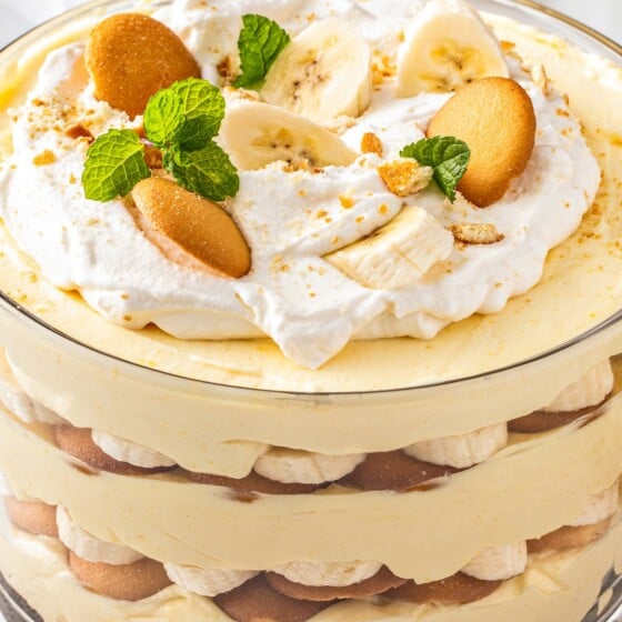 Homemade banana pudding in a glass dish showing off the layers