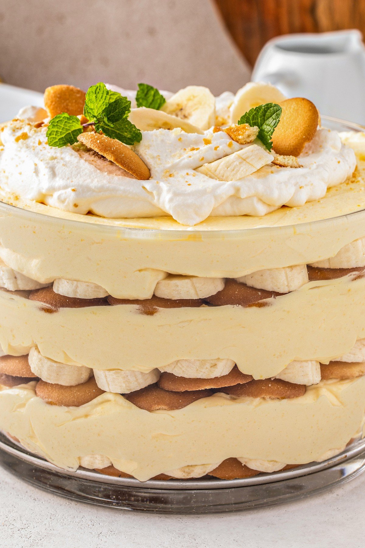 This easy banana pudding recipe has layers of fresh bananas, creamy pudding, vanilla wafers & whipped cream. The best banana pudding ever! Homemade banana pudding with the layers showing