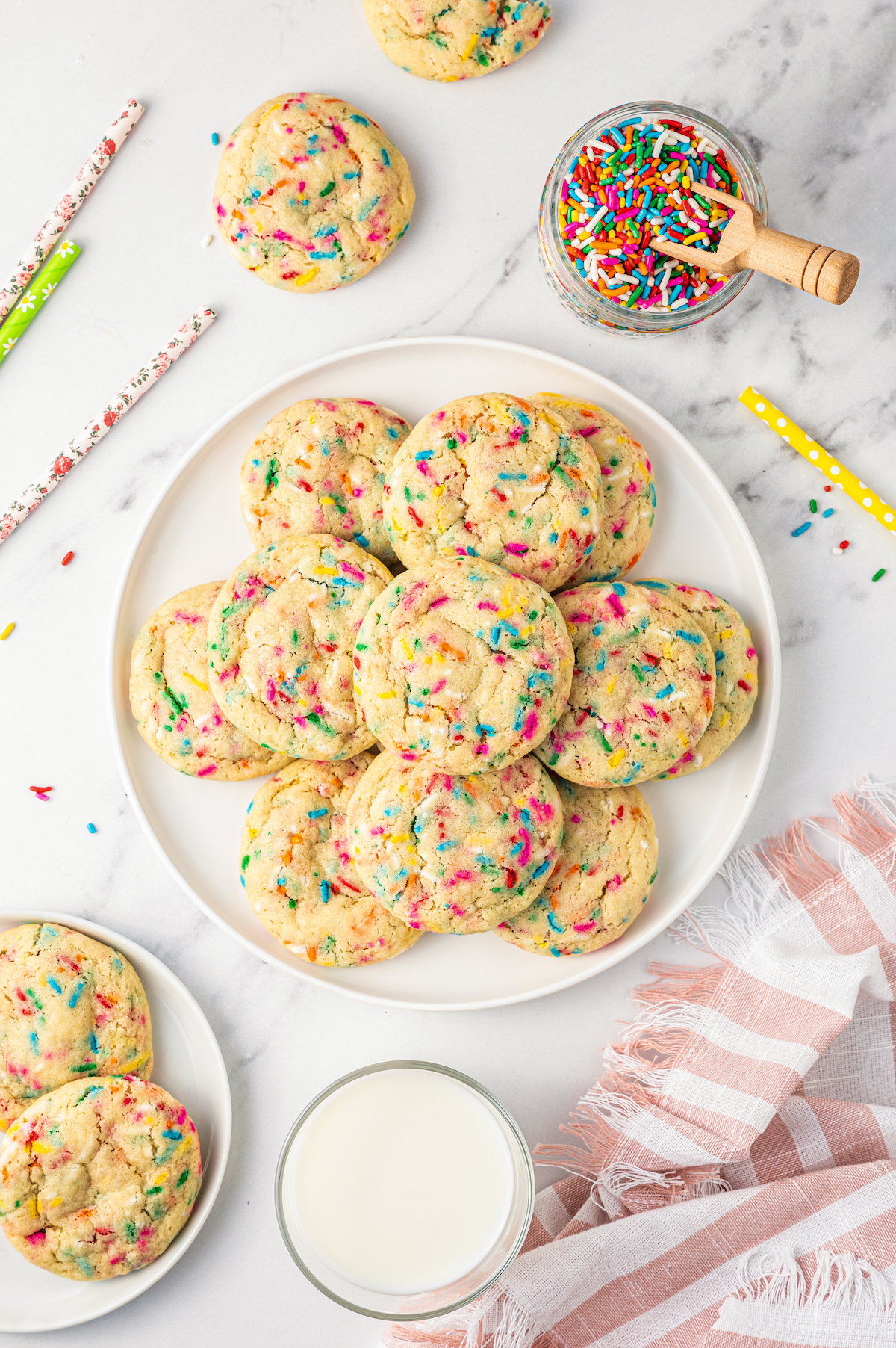 These cute, colorful Funfetti Cookies are soft, sweet, and simple to make. One cheerful sprinkle cookie just isn’t enough! A plate of funfetti cookies.
