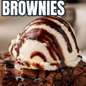 Vanilla ice cream is placed on top of a single chocolatey brownie.