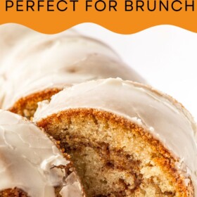 A slice of honey bun cake being lifted with a cake server.