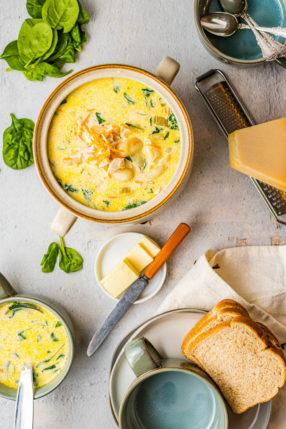 A pot of chicken and gnocchi soup.