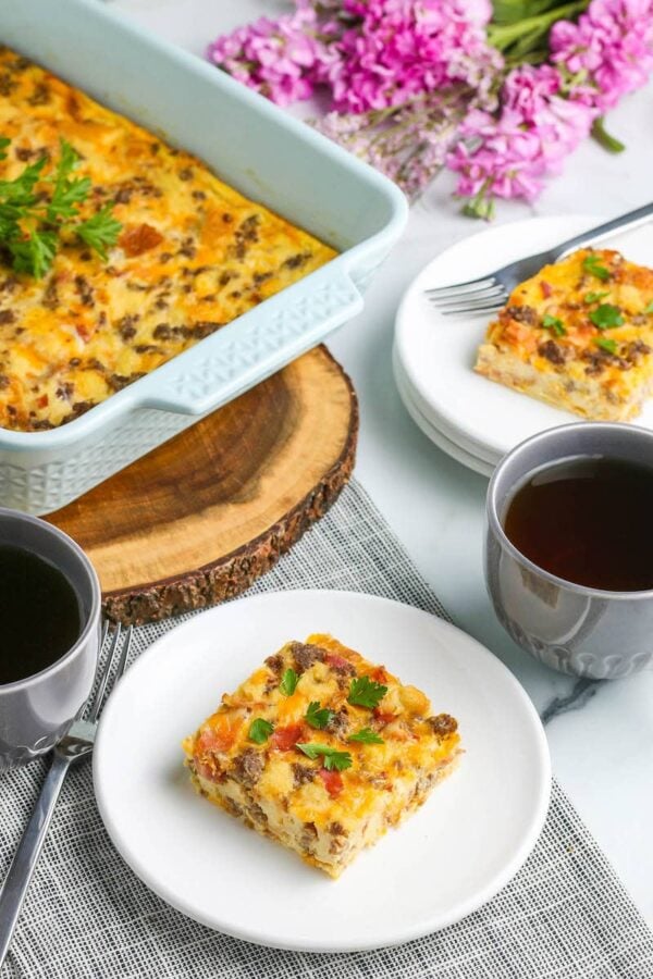 Overnight breakfast casserole served on a white plate.