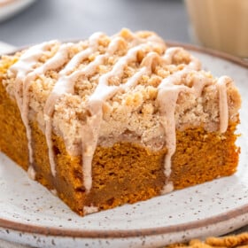 A square of coffee cake on a plate.