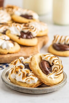 S'mores cookies stacked on top of each other on a metal plate.